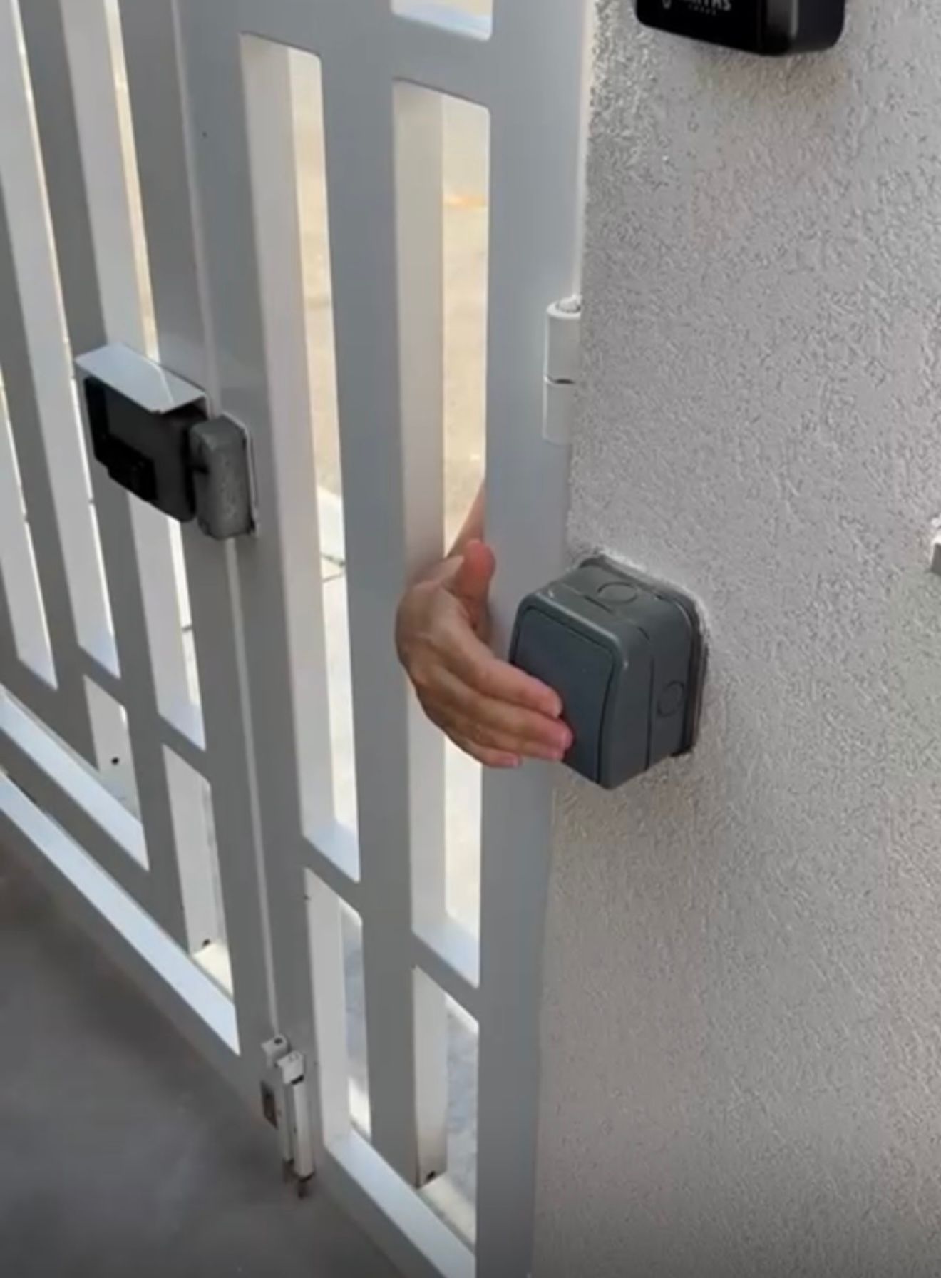 How to open the gate at Villa Ixoria Unit 1